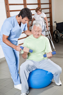 A therpaist working with a male patient